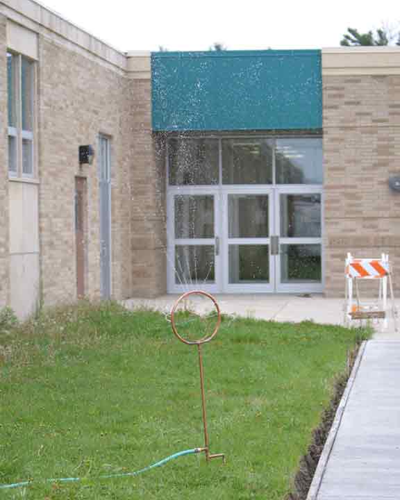 copper art water sprinkler student teacher