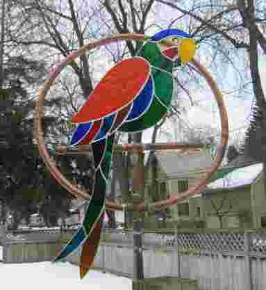 stained glass parrot bird in copper sprinkler