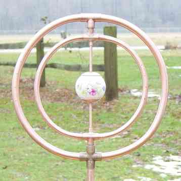 two oval copper hoop sprinklers